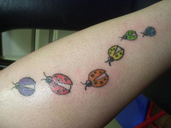 Colorful Ladybug Tattoo On Arm Sleeve