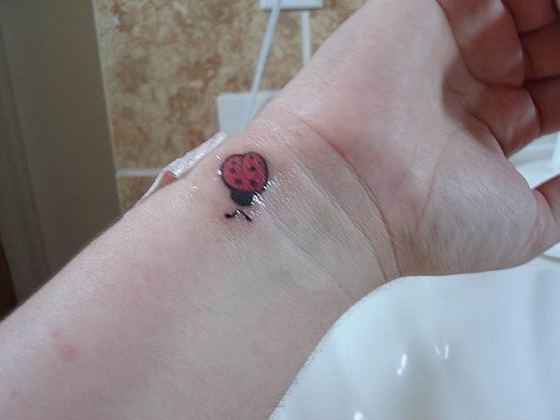 Cute Right Wrist Ladybug Tattoo