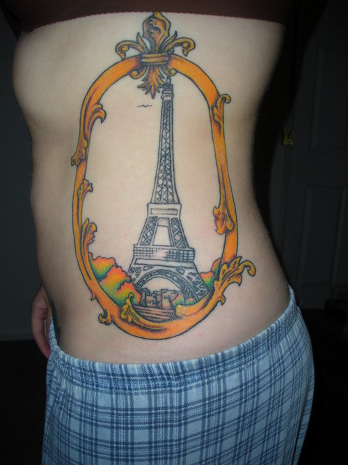 Eiffel Tower In Frame Tattoo On Side Rib