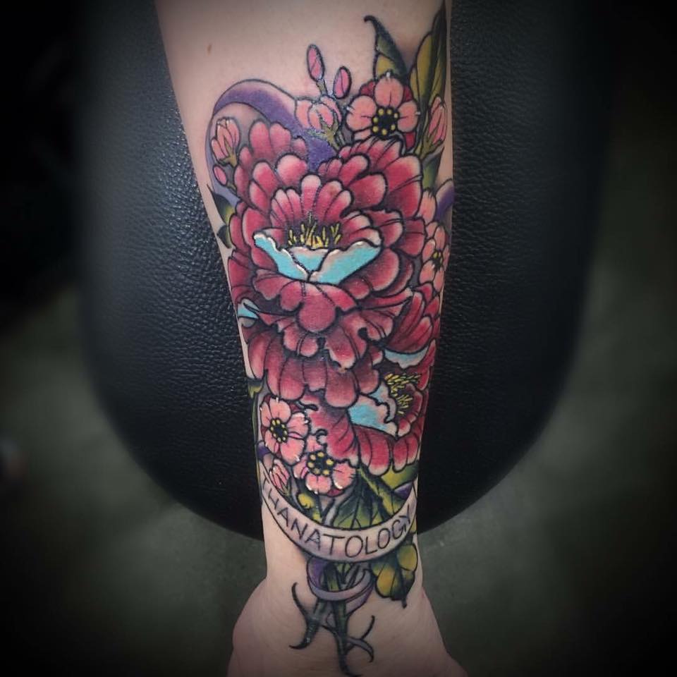 Floral Tattoo On Arm by Revolt Tattoos