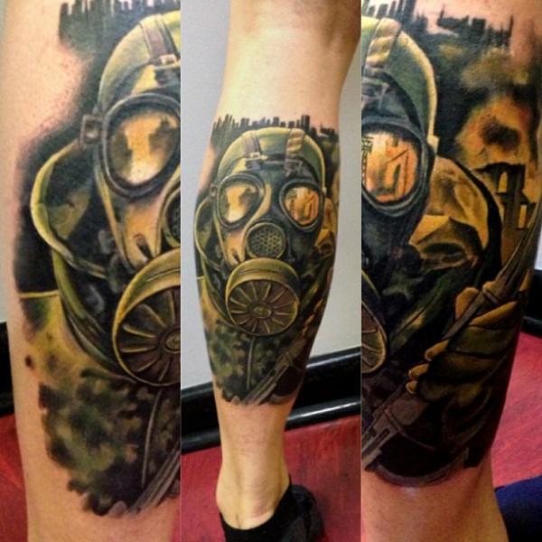 Green Ink Gas Mask Tattoo On Back Leg