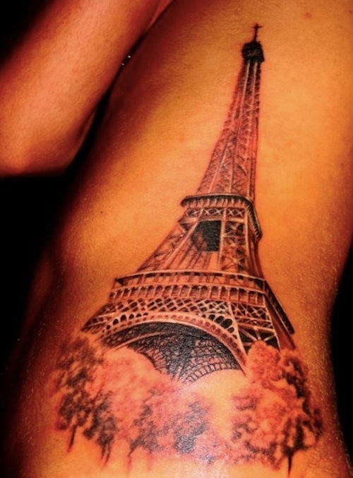 Grey Ink Eiffel Tower Tattoo On Side Rib