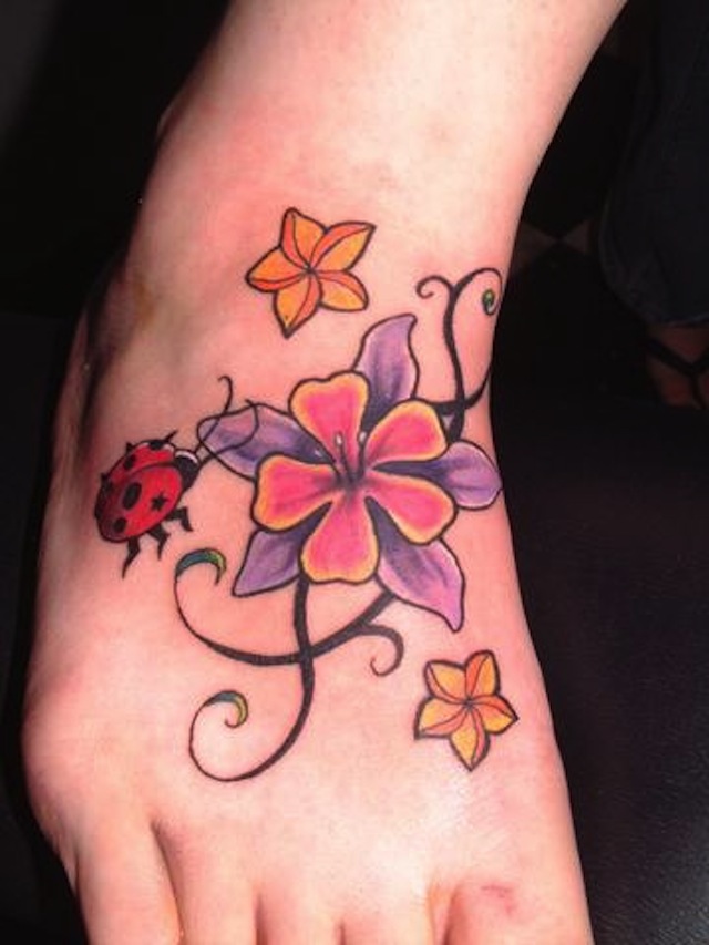 Ladybug And Flowers Tattoo On Right Foot