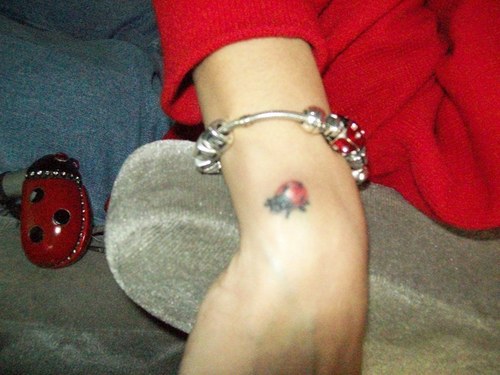 Ladybug Tattoo On Girl Wrist