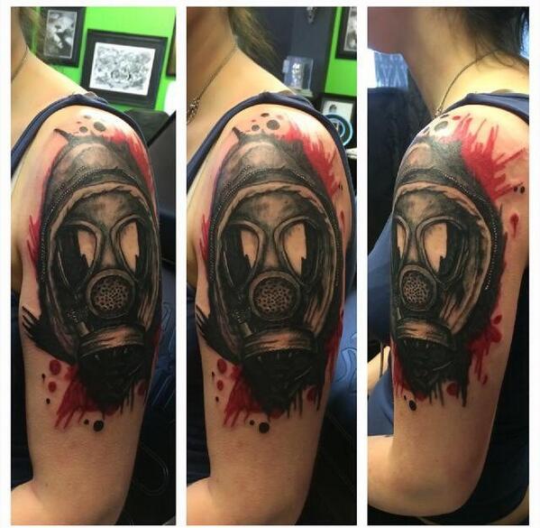 Left Shoulder Black And Grey Gas Mask Tattoo