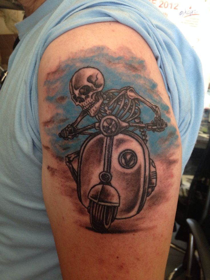 Left Shoulder Skeleton Riding Scooter Tattoo For Men