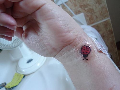 Left Wrist Ladybug Tattoo