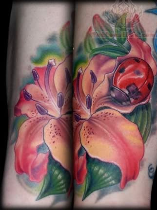 Lily Flower And Ladybug Tattoo On Sleeve
