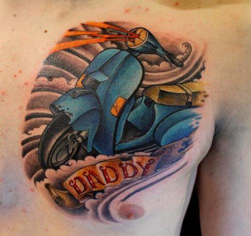 Memorial Daddy Banner And Blue Scooter Tattoo On Chest