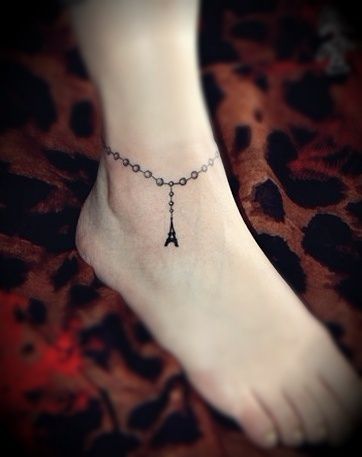 Nice Eiffel Tower Tattoo On Right Ankle