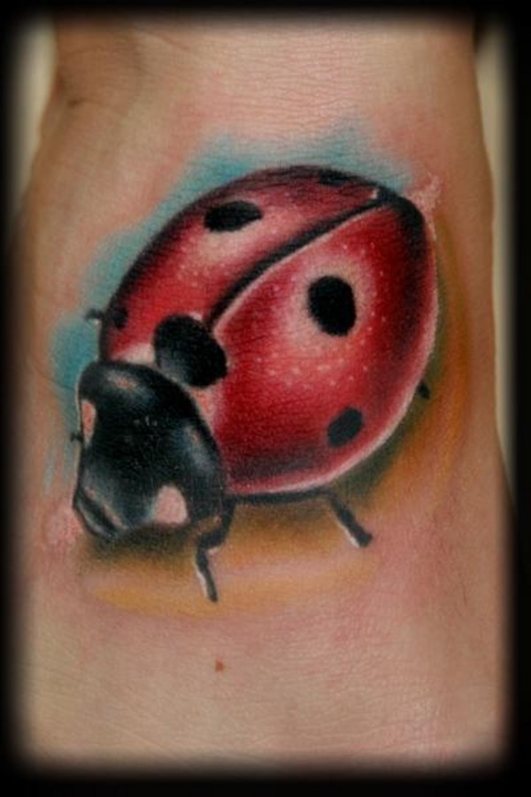 Nice Realistic Ladybug Tattoo On Foot