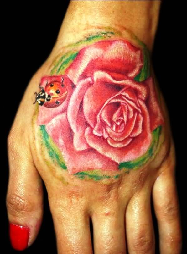 Pink Rose And Ladybug Tattoo On Left Hand