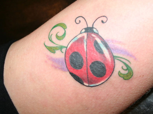 Red Ink Ladybug Tattoo