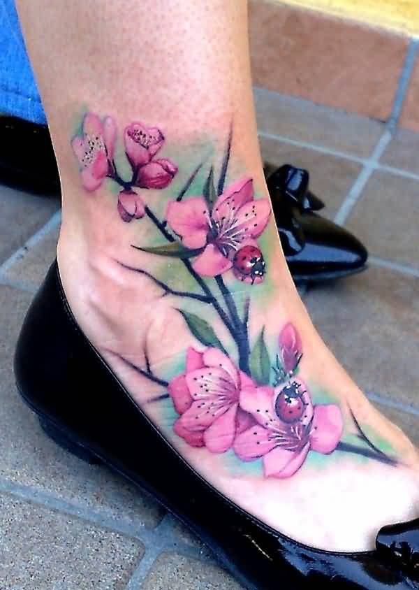 Right Ankle Ladybug On Flowers Tattoo