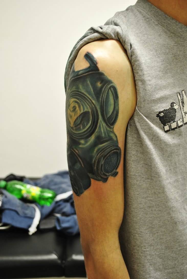 Right Bicep Zombie Gas Mask Tattoo
