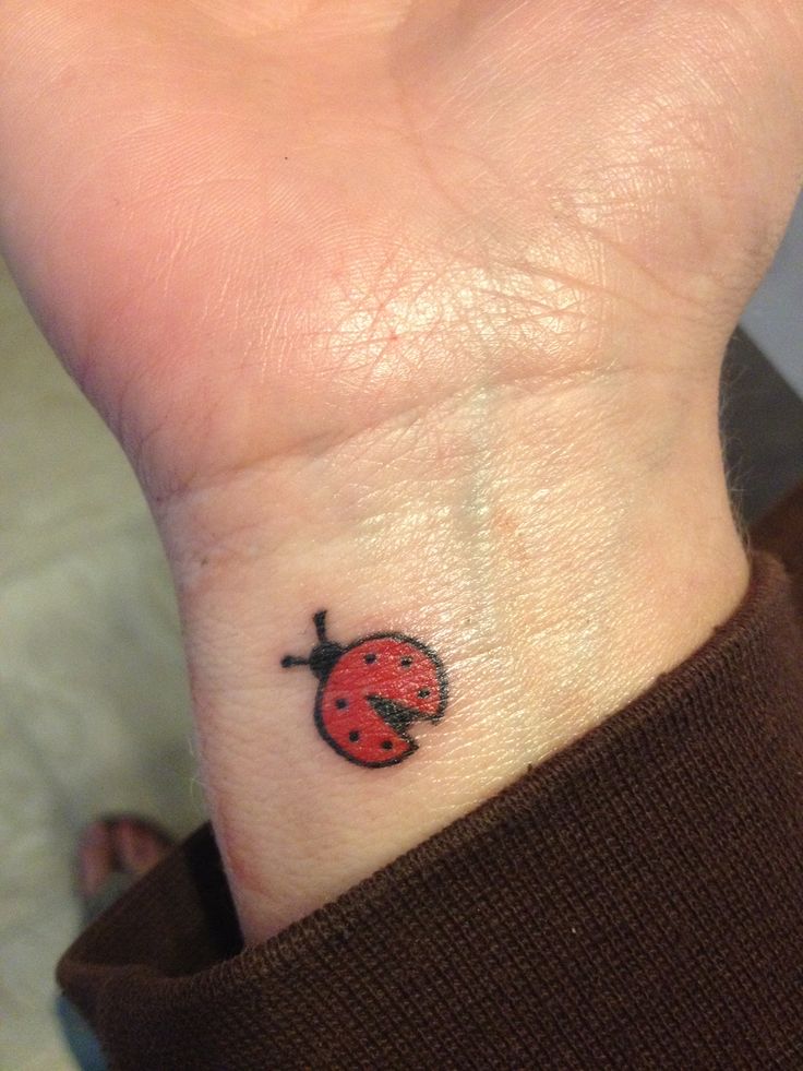 Right Wrist Small Ladybug Tattoo