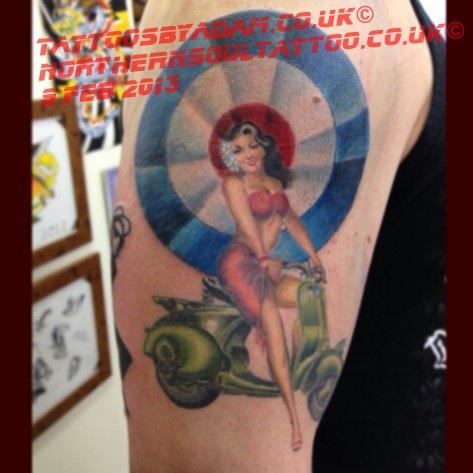 Scooter Girl Tattoo On Right Half Sleeve