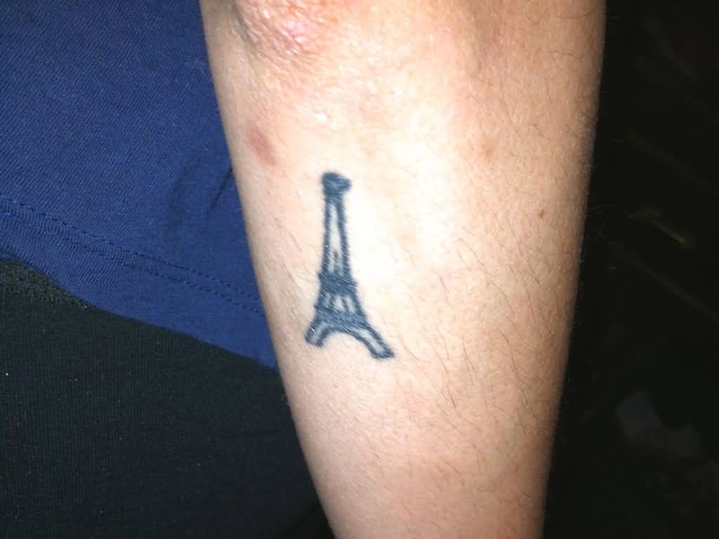 Small Outline Eiffel Tower Tattoo On Right Arm