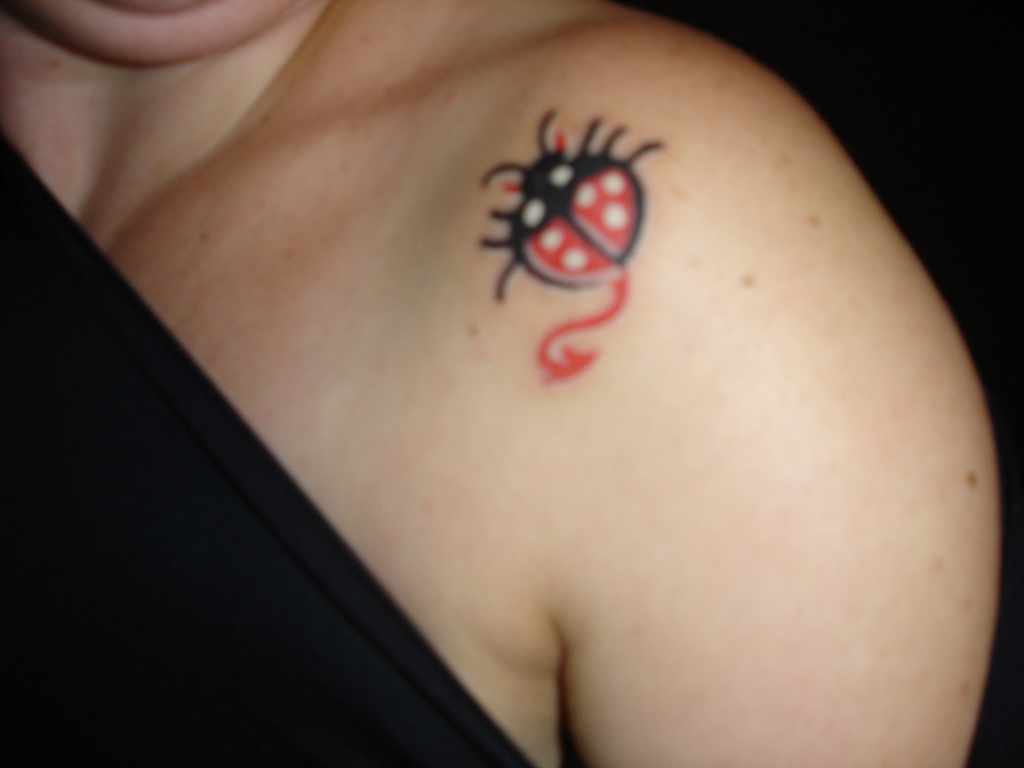 Tail Ladybug Tattoo On Girl Left Shoulder
