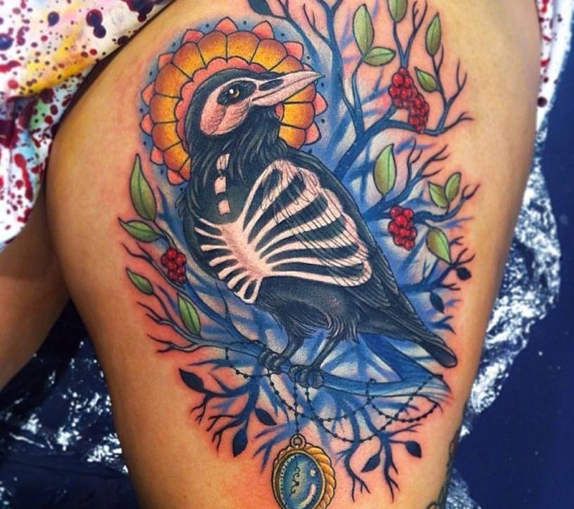 Traditional Bird Tattoo On Girl Thigh