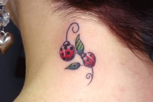 Two Ladybug Tattoos On Nape