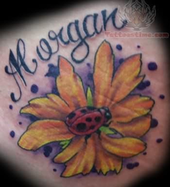 Yellow Flower And Ladybug Tattoo