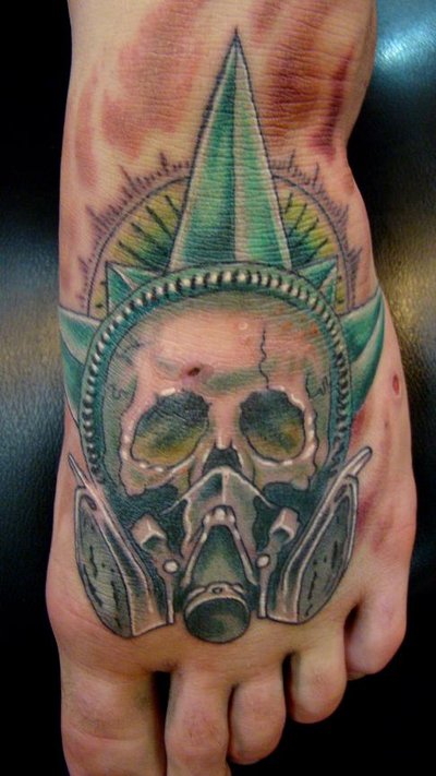 Zombie Gas Mask Tattoo On Left Foot