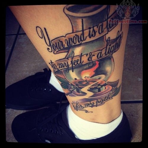 Candle Lamp With Banner Tattoo On Leg
