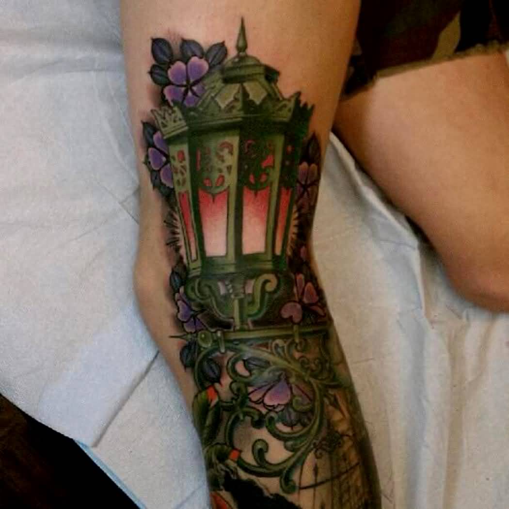Green Ink Lamp Tattoo On Leg