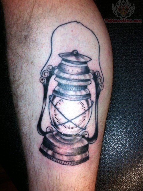 Grey Ink Oil Lamp Tattoo On Leg