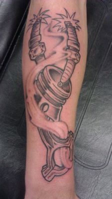 Grey Ink Spark Plug Tattoo On Arm Sleeve