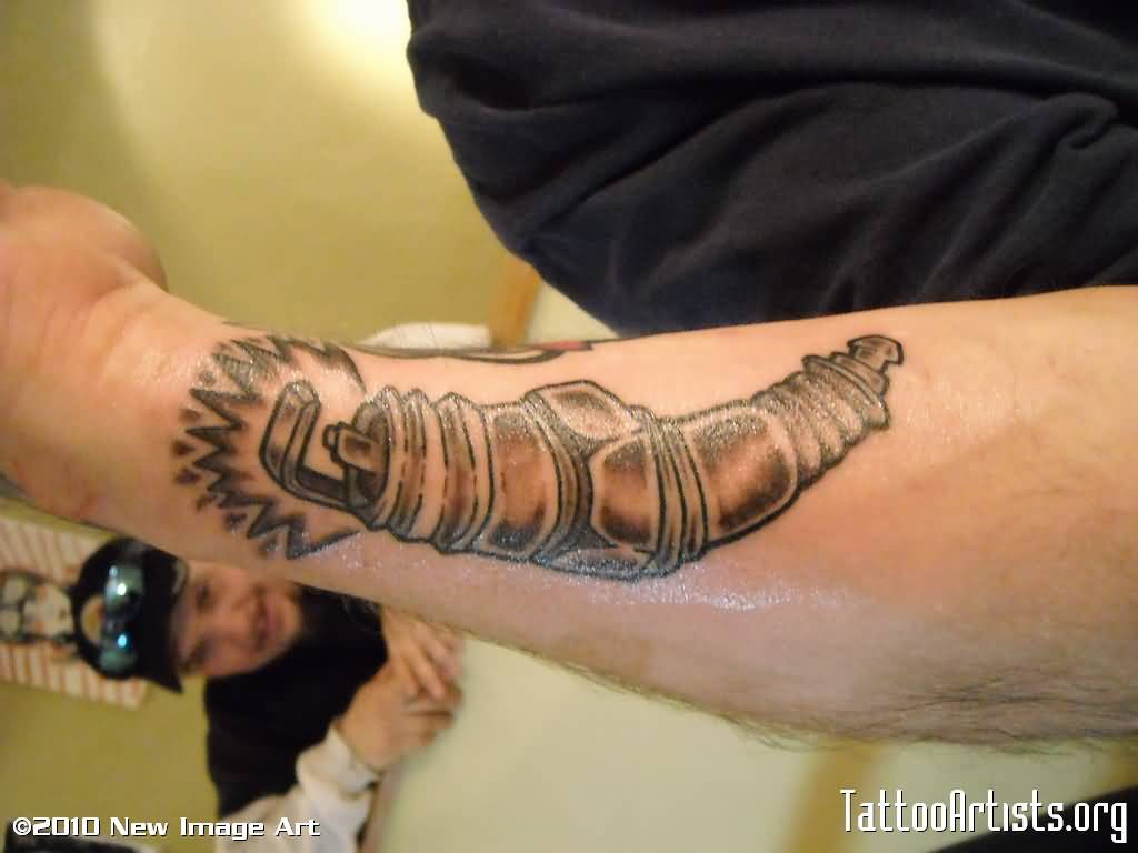 Grey Spark Plug Tattoo On Arm