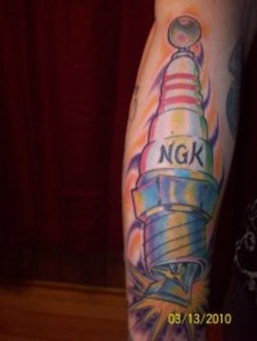 New School Spark Plug Tattoo On Right Arm