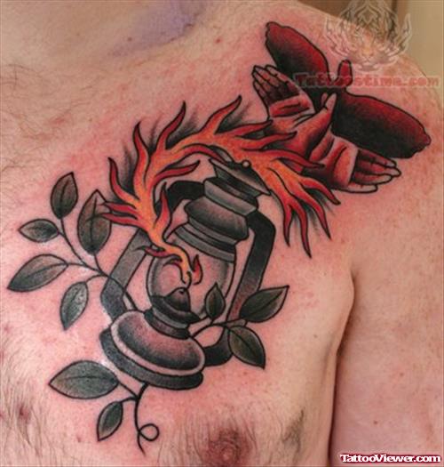 Oil Lamp Tattoo On Man Front Shoulder