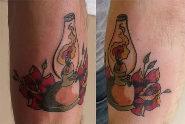 Pretty Red Rose And Lamp Tattoo