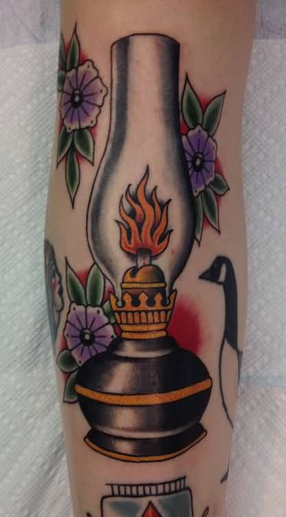 Purple Flowers And Old Lamp Tattoo