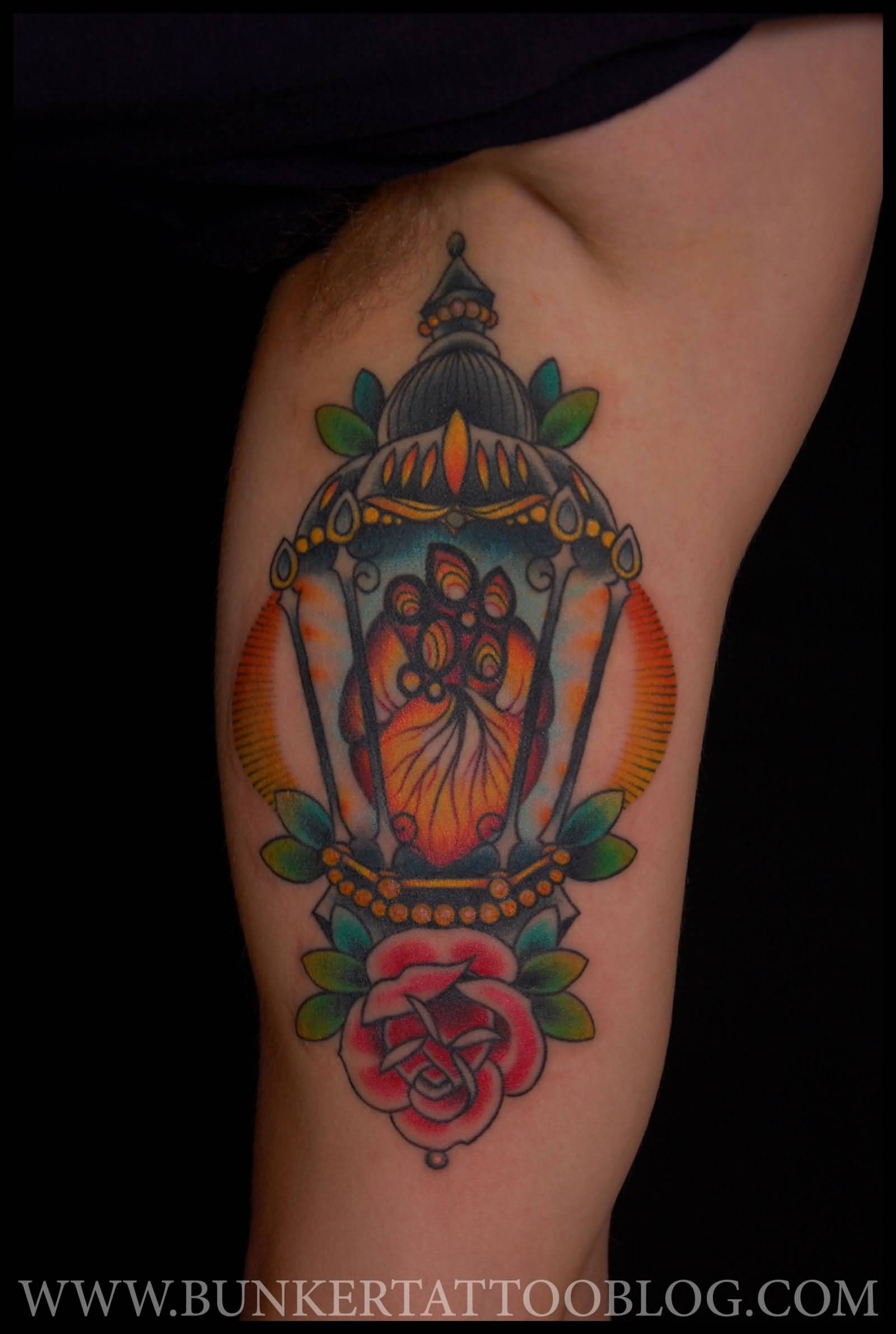 Red Rose Lamp Tattoo On Inner Bicep