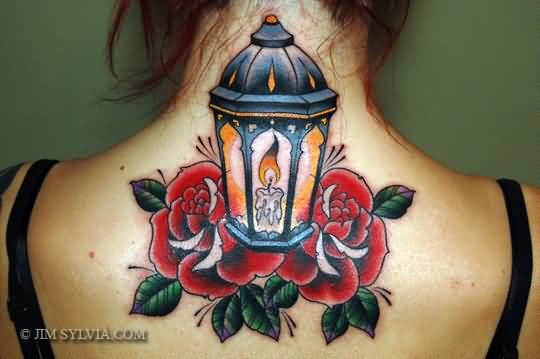 Red Roses And Candle Lamp Tattoo On Upper Back