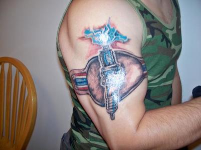 Right Bicep Color Ink Spark Plug Tattoo