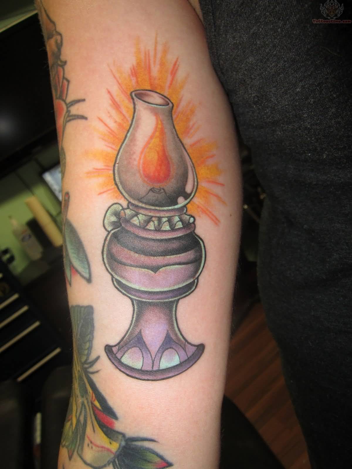 Right Bicep Lamp Tattoo