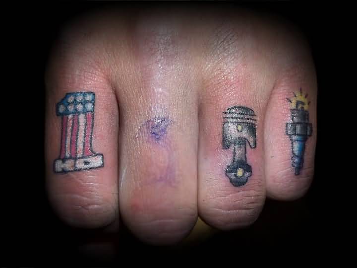 Small Piston And Spark Plug Tattoo On Finger