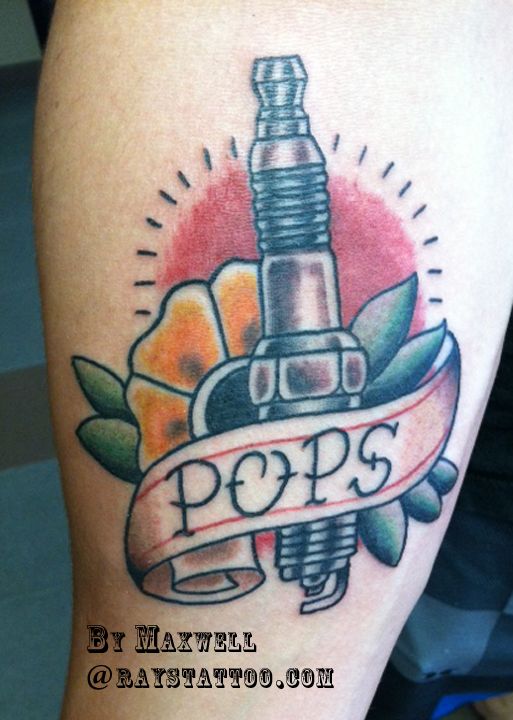 Traditional Spark Plug With Pop Banner Tattoo On Right Arm