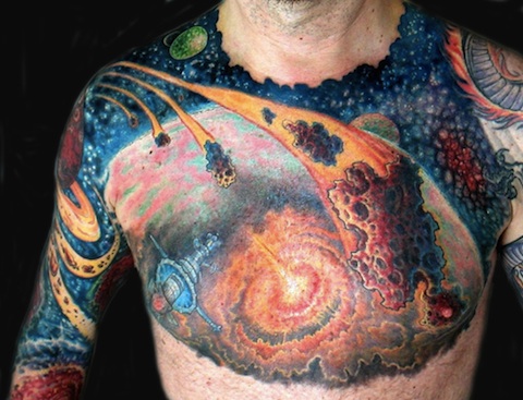 Amazing Space Tattoo On Man Chest