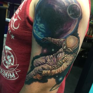 Astronaut Tattoo On Left Bicep by Josh Bodwell