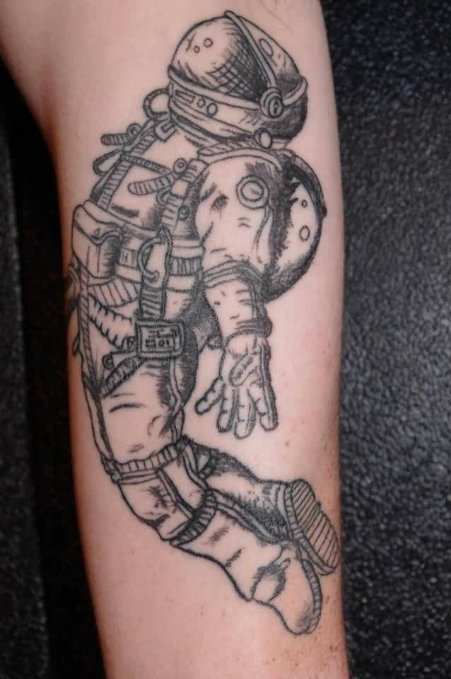 Black And Grey Astronaut Tattoo On Left Sleeve