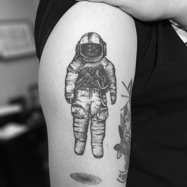 Black And Grey Astronaut Tattoo On Shoulder