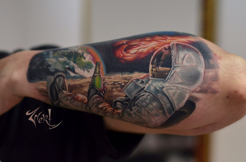 Left Arm Color Ink Astronaut In Space Tattoo