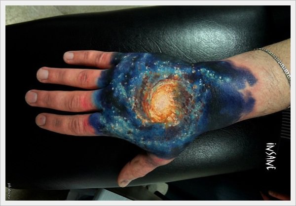 Right Hand Color Ink Space Tattoo