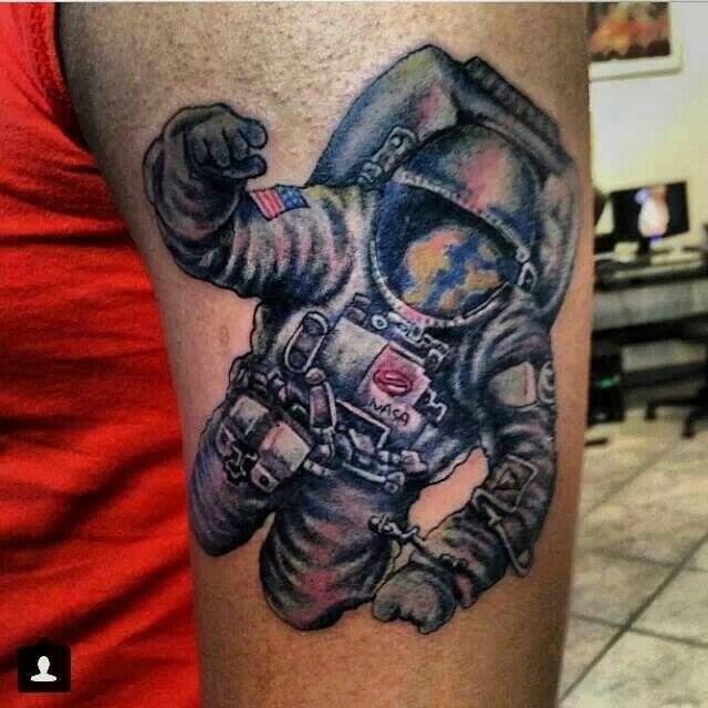 Unique Astronaut Tattoo On Left Bicep