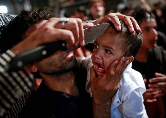 A Shia Muslim Has His Child Gashed With A Knife During Muharram Celebration